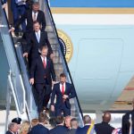 Tom Cole walking off Air Force One