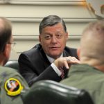 Tom Cole in a meeting